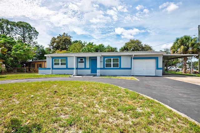 single story home featuring a front yard, a garage, and a carport