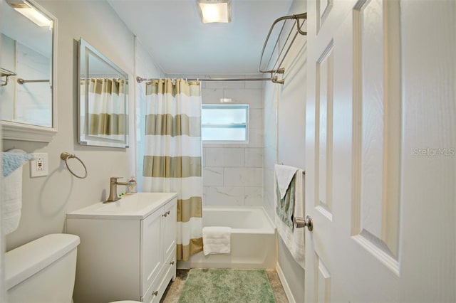 full bathroom with vanity, shower / bath combination with curtain, toilet, and tile patterned flooring