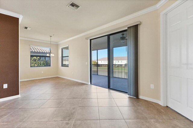 unfurnished room with crown molding, light tile patterned floors, and ceiling fan with notable chandelier