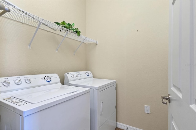 laundry room featuring washer and dryer