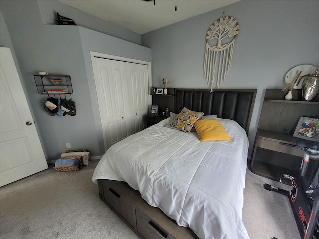 carpeted bedroom with a closet