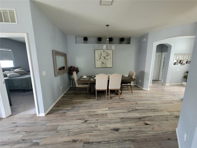 dining room with light hardwood / wood-style floors