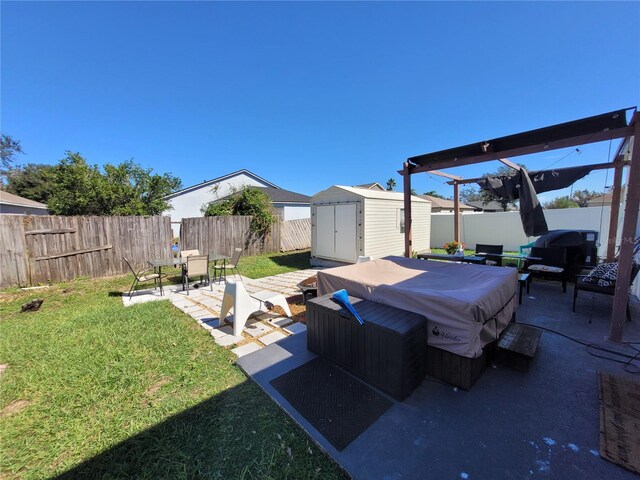 view of yard with a patio area and a shed