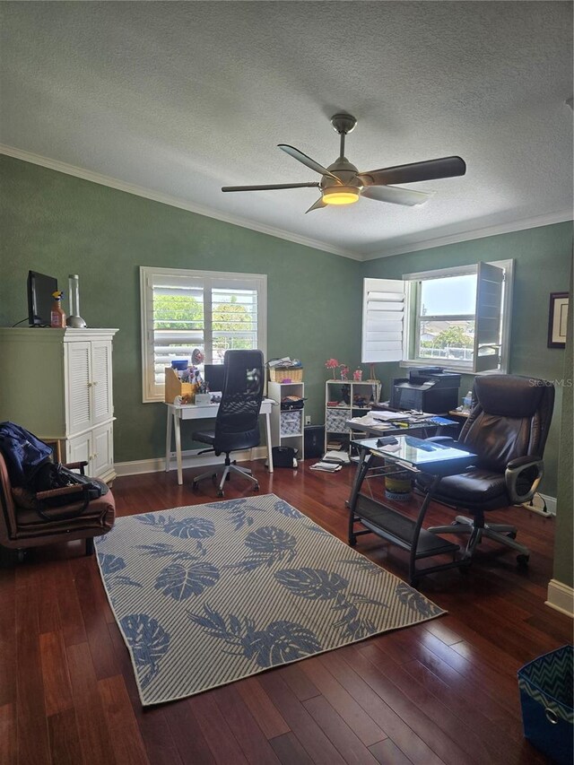 office space featuring ornamental molding, a textured ceiling, ceiling fan, dark hardwood / wood-style floors, and lofted ceiling