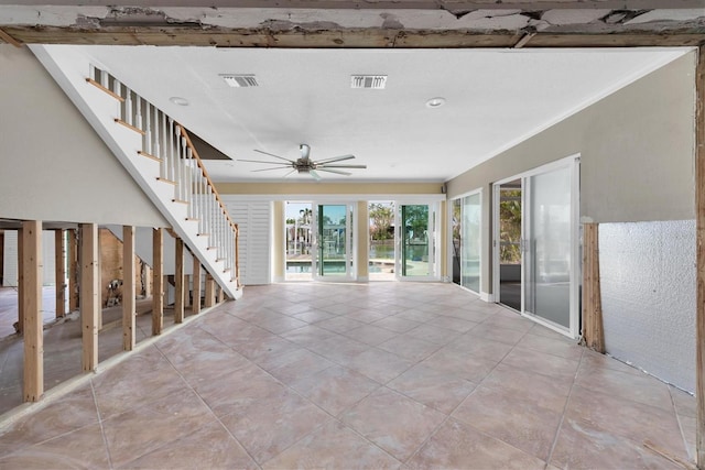 interior space featuring ceiling fan