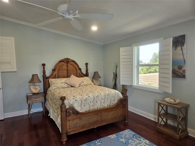 bedroom with crown molding, ceiling fan, and dark wood-type flooring