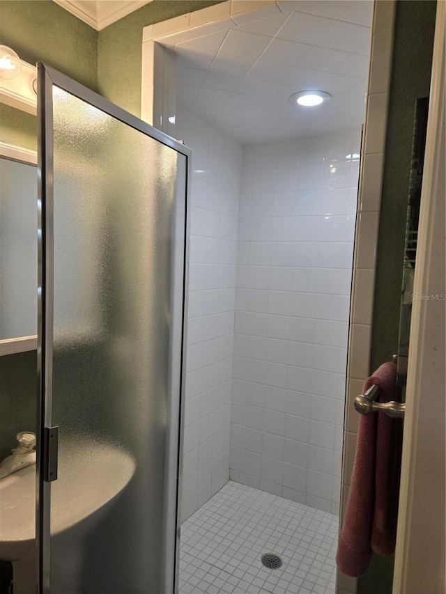 bathroom featuring an enclosed shower