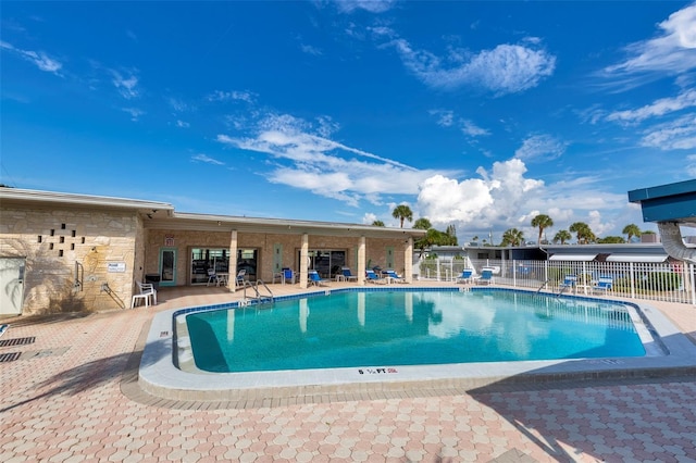 view of swimming pool featuring a patio