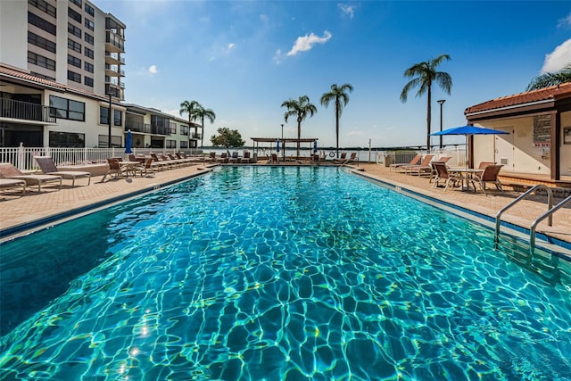 view of swimming pool featuring a patio