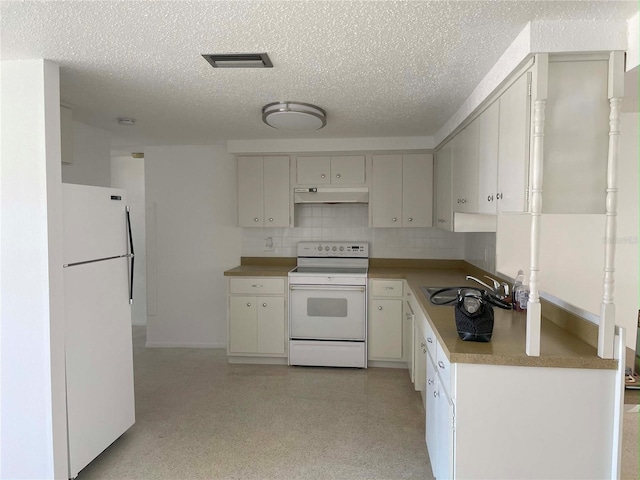 kitchen featuring white appliances, a textured ceiling, decorative backsplash, and sink