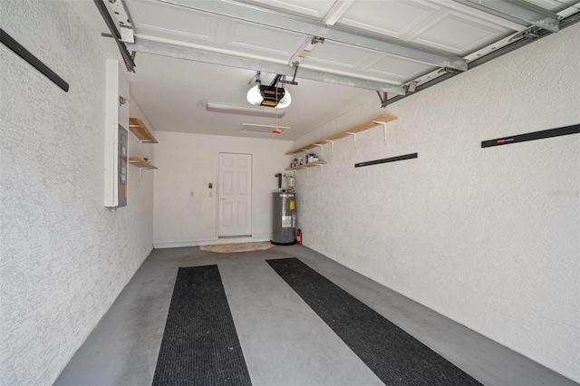 garage with a garage door opener, electric water heater, and electric panel