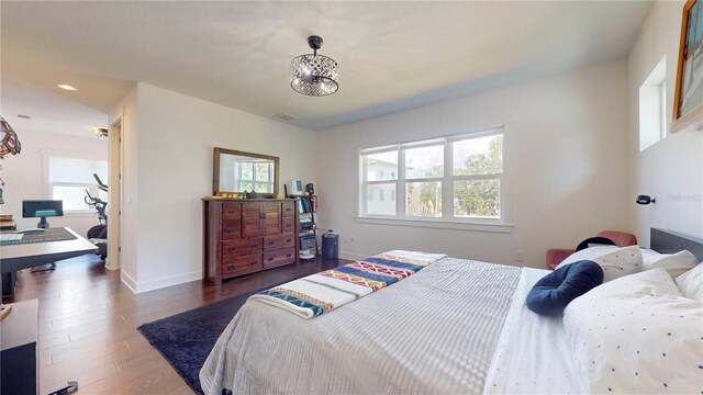 bedroom featuring dark hardwood / wood-style floors