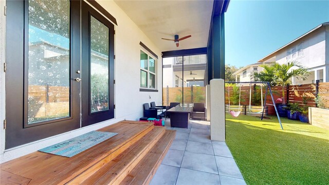 view of patio / terrace featuring an outdoor living space and ceiling fan