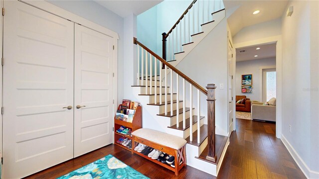 stairway with wood-type flooring