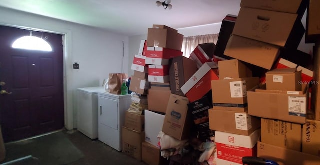 storage room with washing machine and clothes dryer