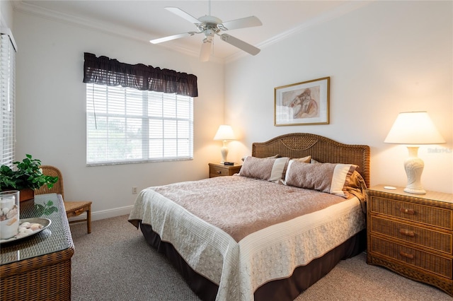 bedroom featuring ornamental molding, carpet floors, and ceiling fan