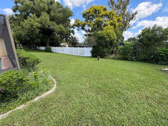 view of yard with fence
