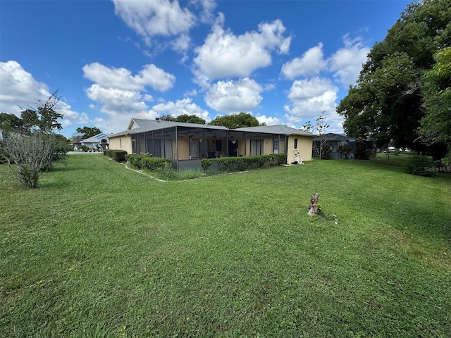 view of yard with a lanai