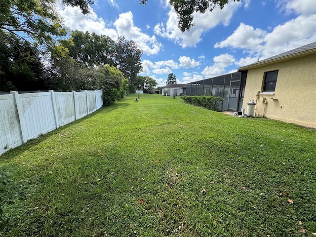 view of yard with a sunroom