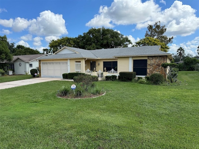 ranch-style home with a garage and a front lawn