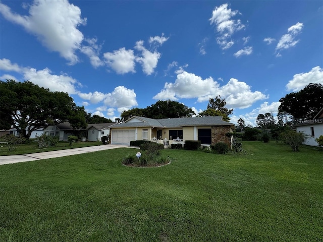 single story home with a garage and a front lawn