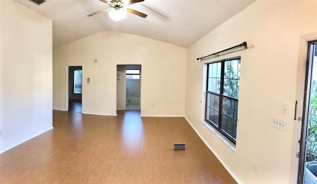 spare room with ceiling fan, wood-type flooring, and lofted ceiling