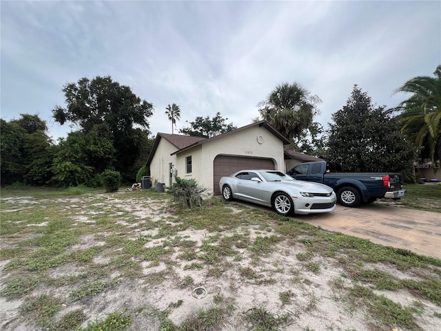 view of home's exterior with a garage