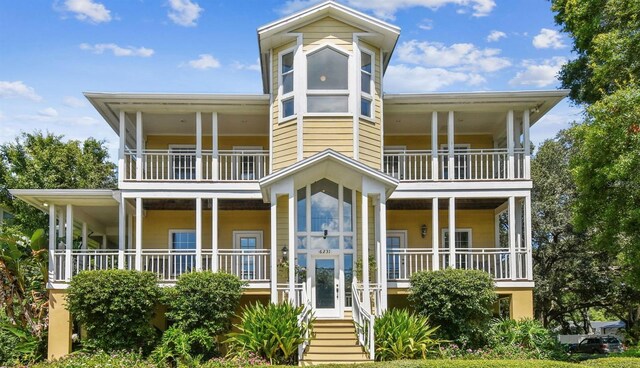 view of front of home with a balcony