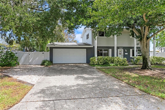 view of front of property with a garage