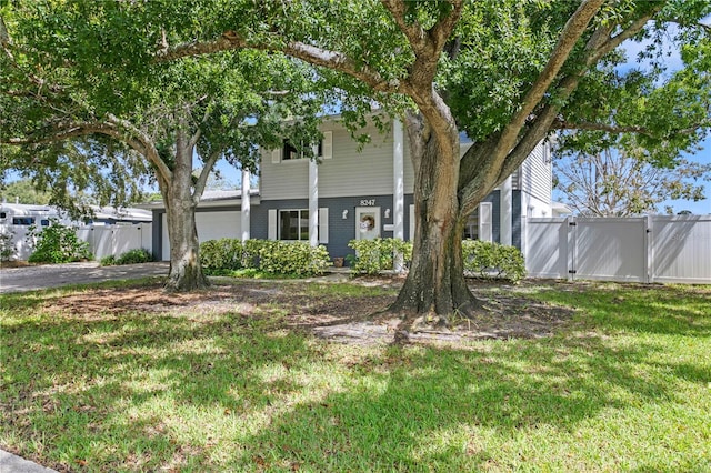 view of front of home with a front lawn