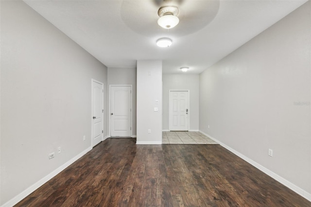 spare room featuring ceiling fan and hardwood / wood-style flooring