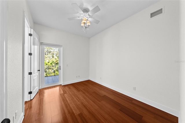 empty room featuring ceiling fan and wood-type flooring