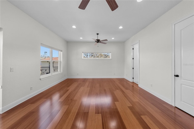 empty room featuring ceiling fan and wood-type flooring