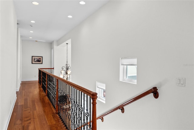 corridor featuring hardwood / wood-style flooring