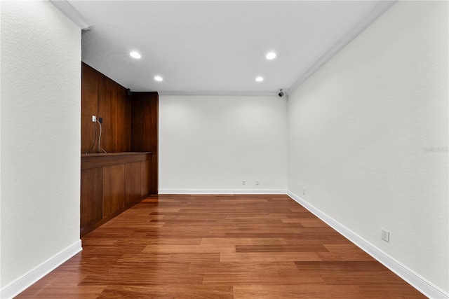 unfurnished room featuring hardwood / wood-style floors