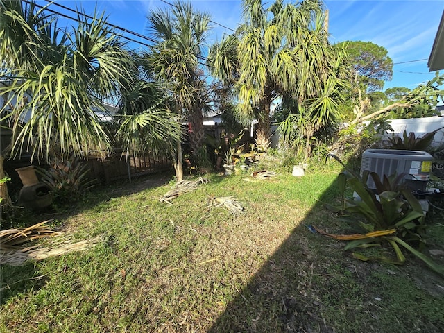 view of yard with central AC unit