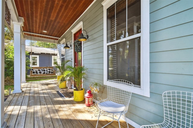 wooden terrace with covered porch