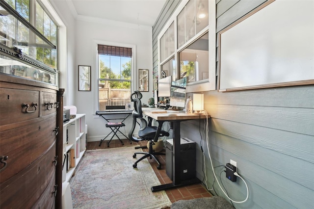 home office featuring ornamental molding and dark hardwood / wood-style flooring