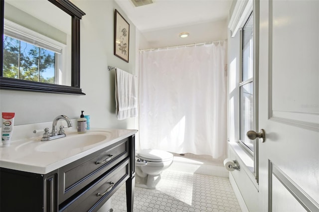 bathroom with vanity, toilet, tile patterned floors, and a shower with curtain