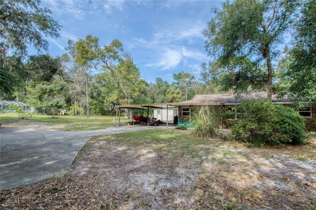 exterior space featuring a carport