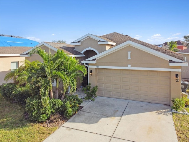 view of front of property with a garage