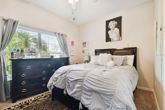 carpeted bedroom with ceiling fan