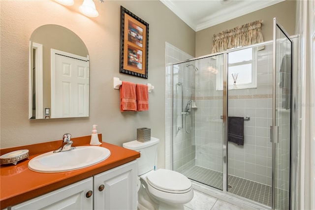 bathroom featuring toilet, an enclosed shower, and vanity