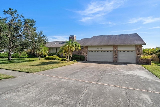 ranch-style home featuring a front yard and a garage