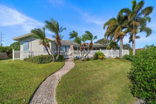 view of front of home with a front lawn