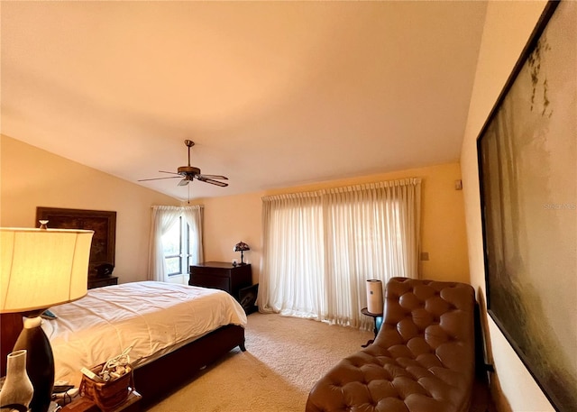 bedroom with lofted ceiling, carpet floors, and ceiling fan