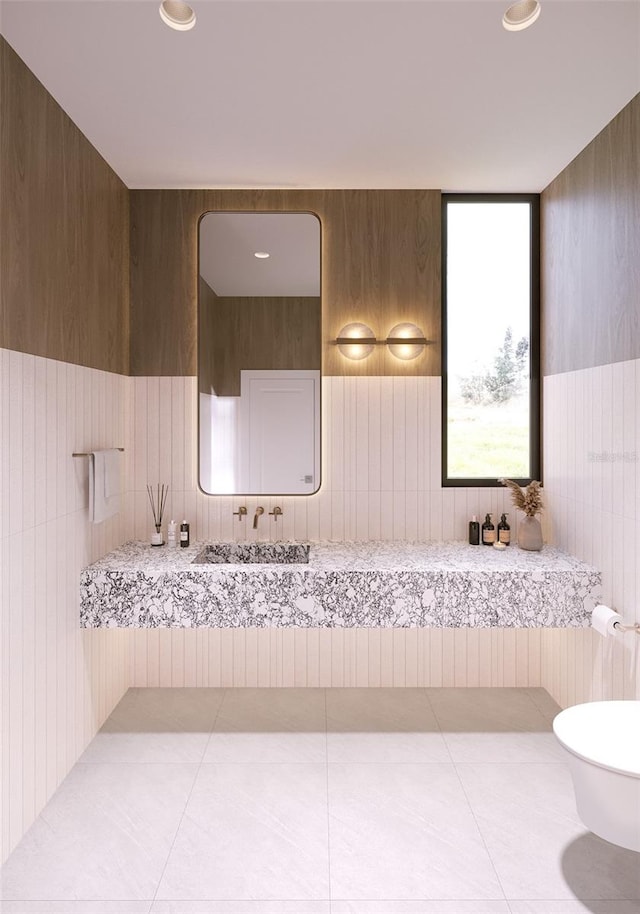 bathroom with vanity, toilet, and tile patterned floors