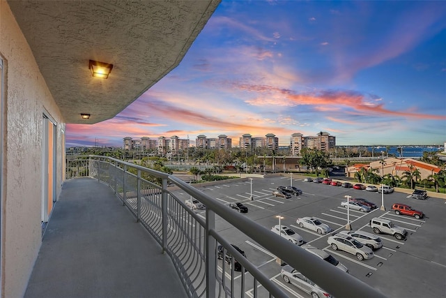 view of balcony at dusk