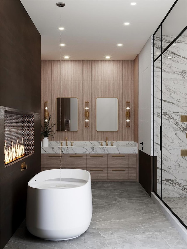 bathroom featuring tile walls and vanity