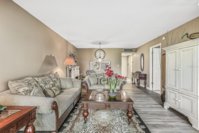 living room featuring dark hardwood / wood-style floors